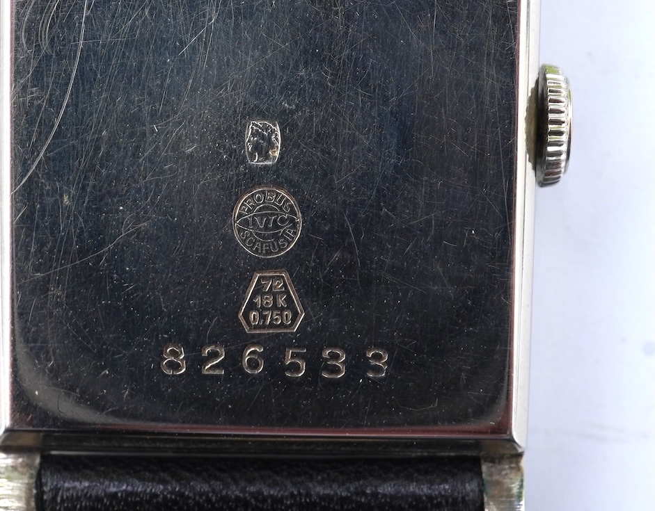 A lady's 18k white gold International Watch Company manual wind wrist watch, on a later associated leather strap
